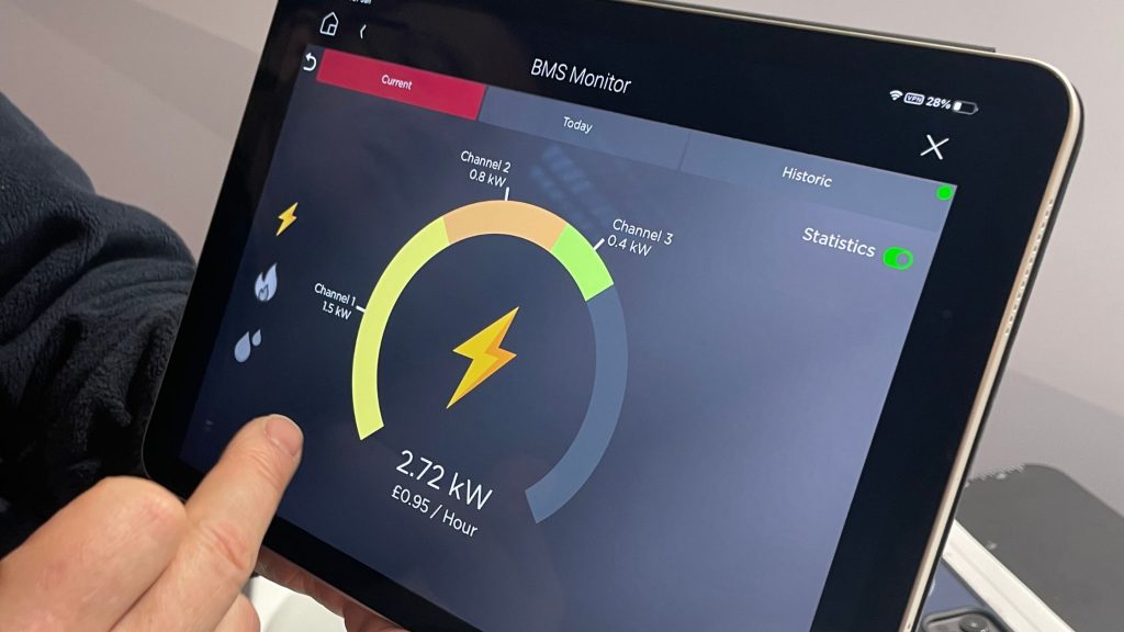 An image of a Janus BMS monitor integrated with a Control4 smart home is shown. 